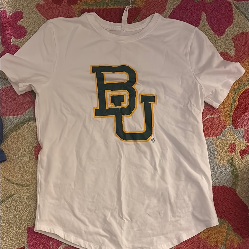 Lululemon BU Shirt - size 4 - never worn but the green has come off bit